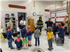 Firefighters Speak with Scouts About Equipment