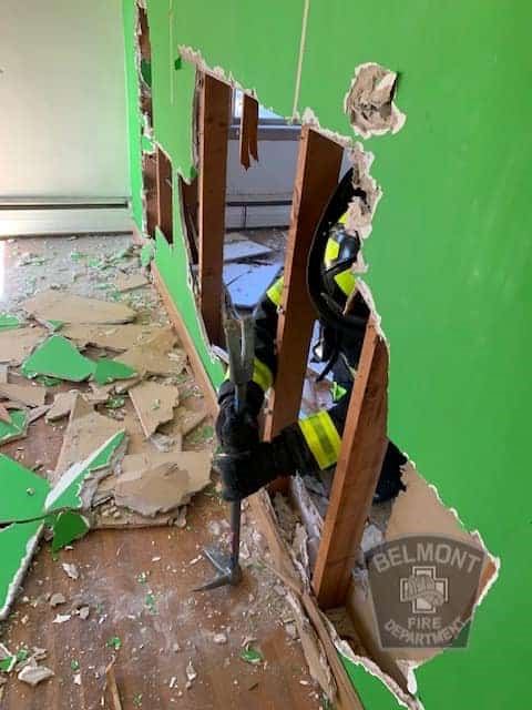 Firefighter Training in Breaking Down Drywall